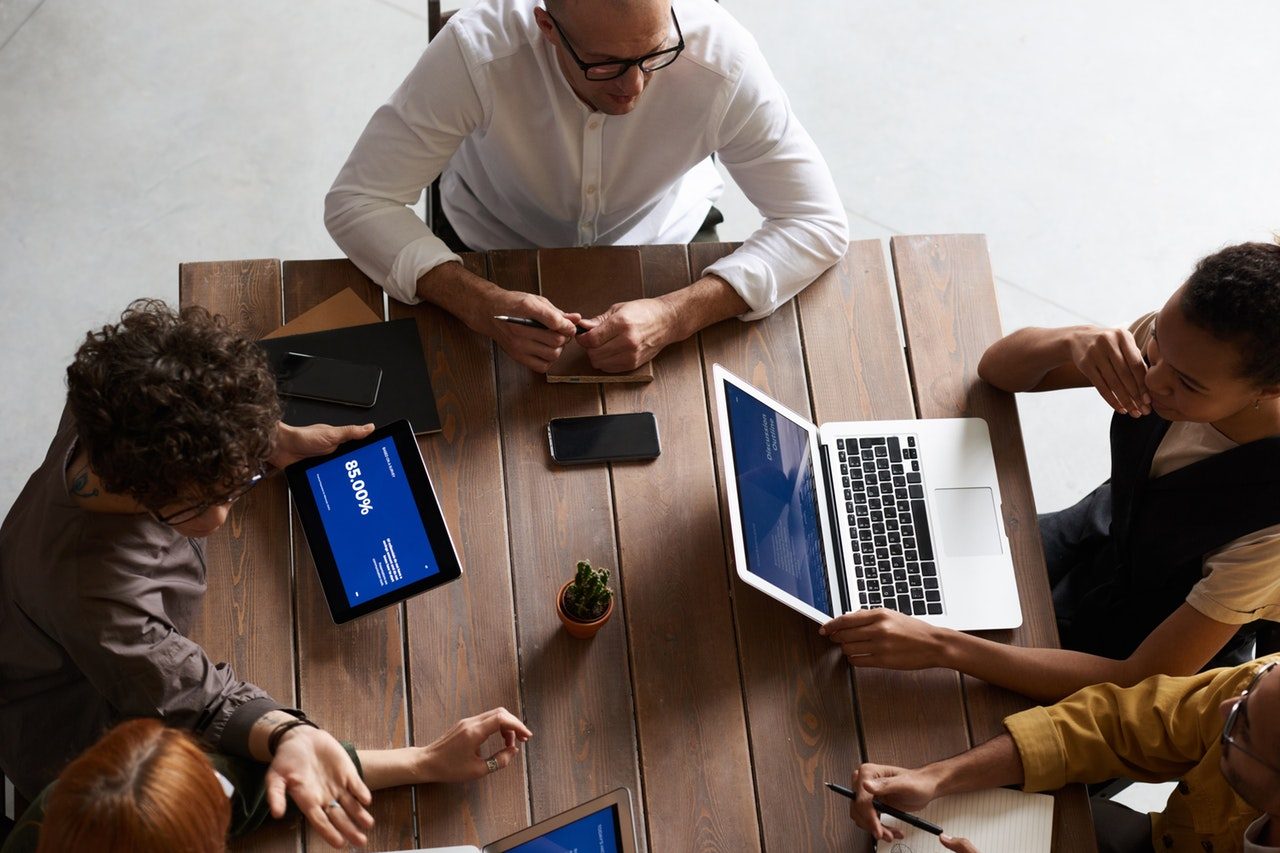 top-view-photo-of-people-having-a-meeting-3182822